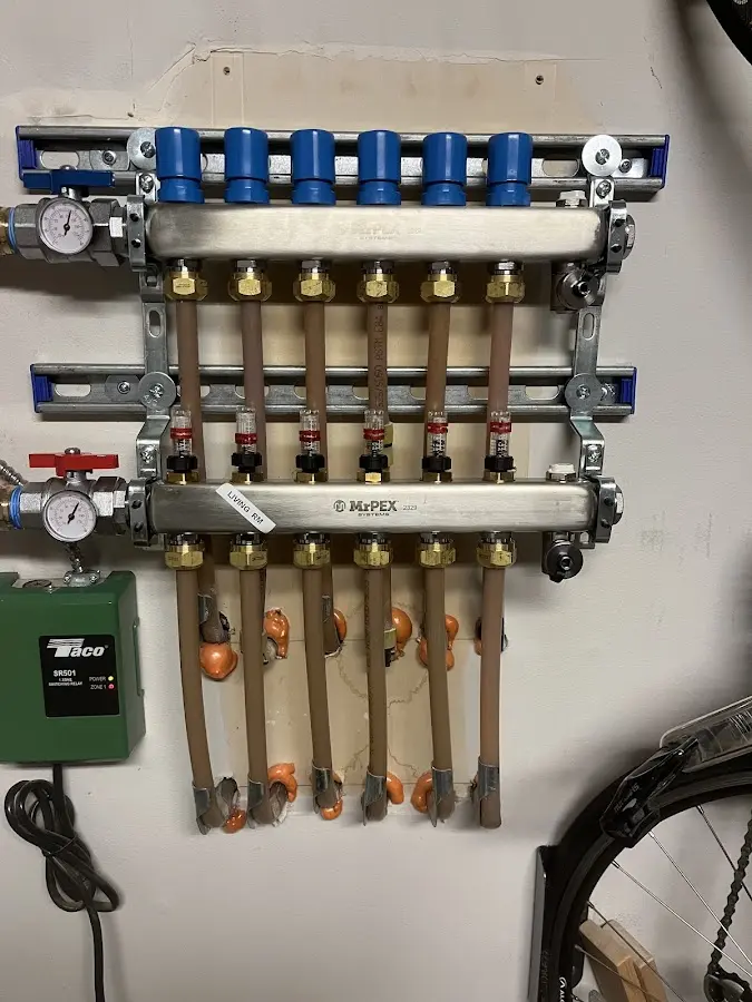 Plumber performing Water Heater Repair at a residential property in Hermitage